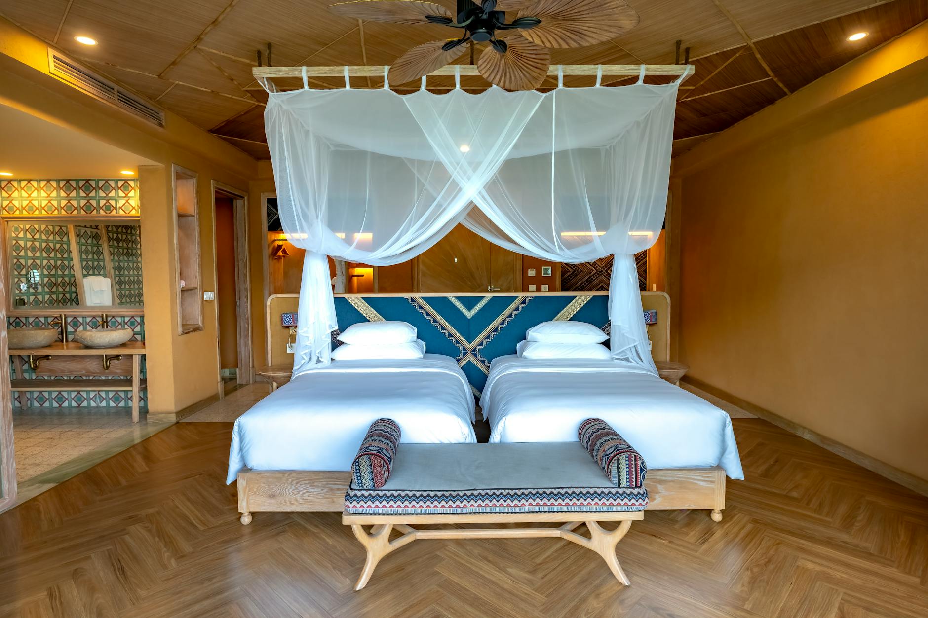 Hotel guestroom with custom casegoods and soft furnishings
