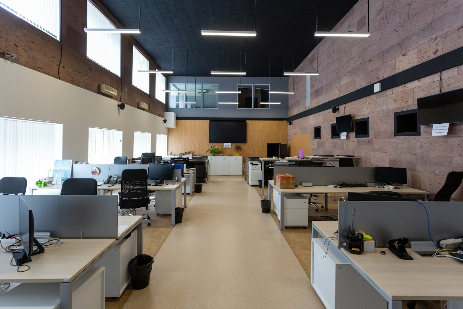 Open-plan office with rows of workstations