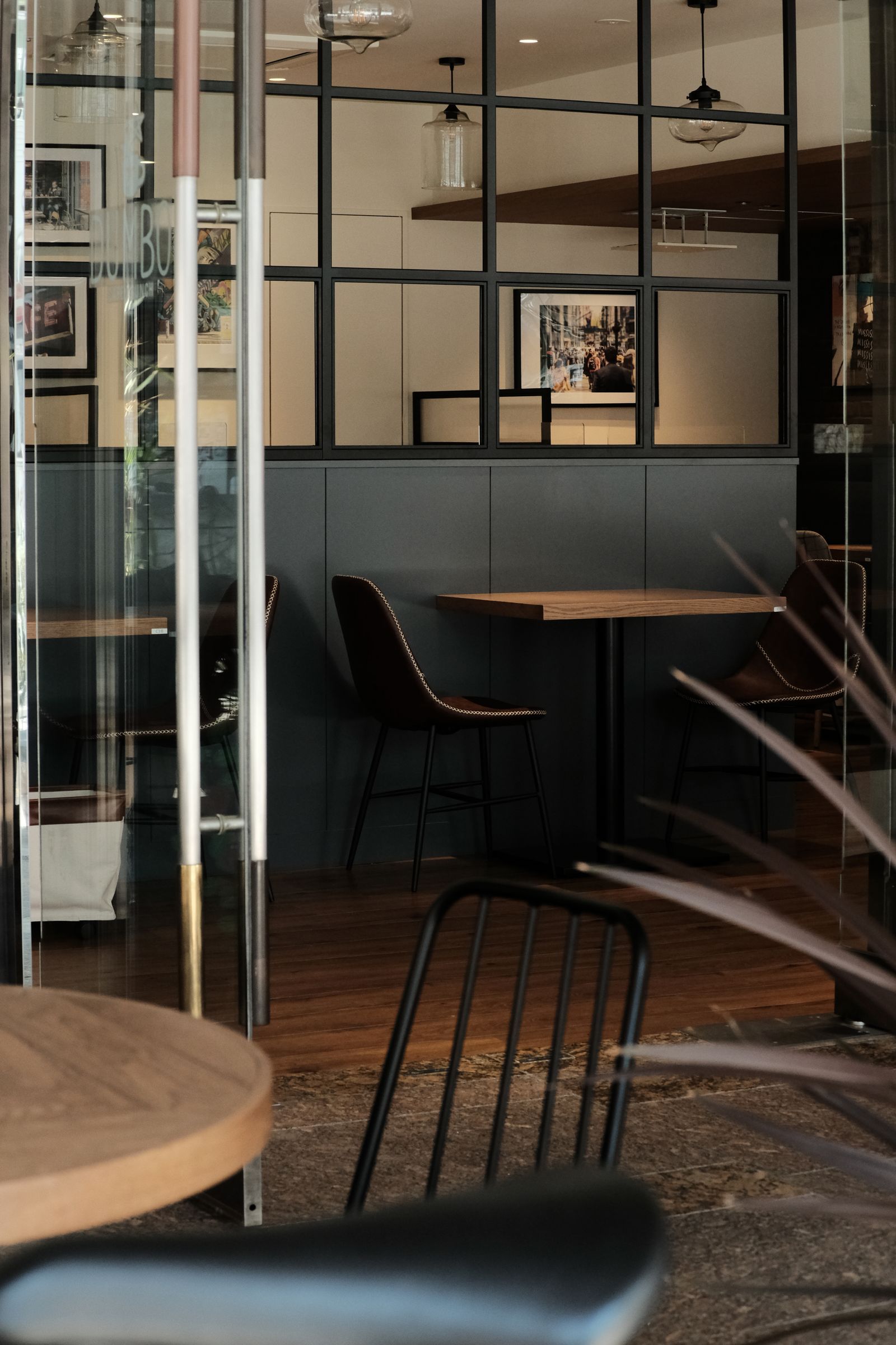 Restaurant interior with high tables and stools